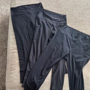 2 Aerie Classic Black Leggings and one athleta black legging.